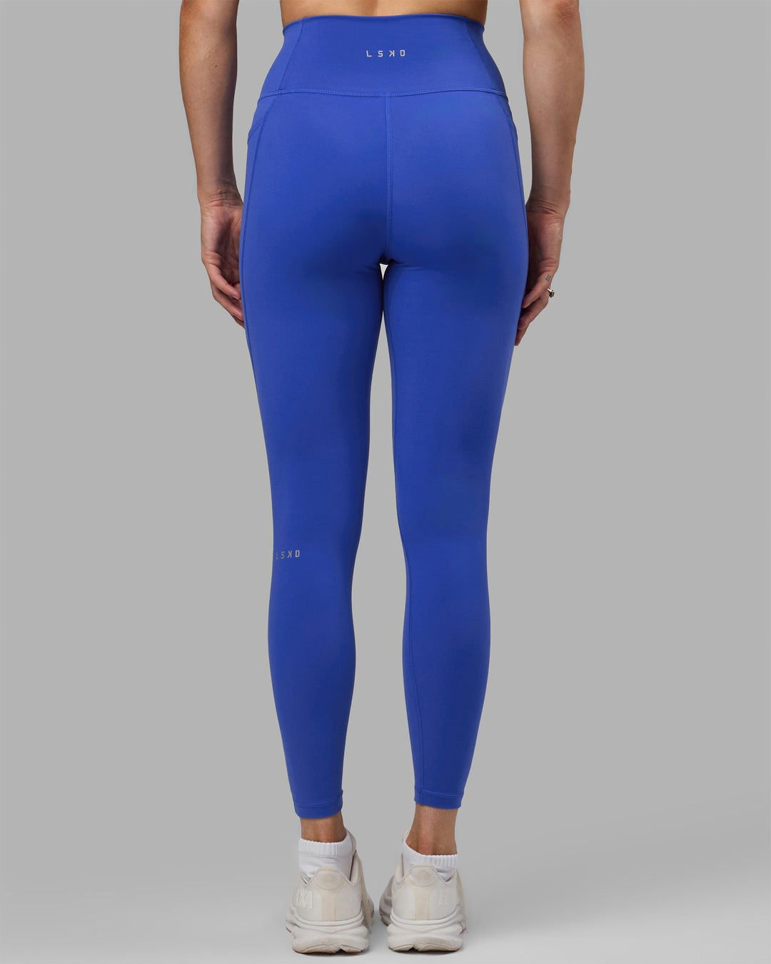 Woman wearing Fusion Ultra High-Rise Full Length Legging Pockets - Power Cobalt | Model:Remi | Size:S
