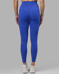Woman wearing Fusion Ultra High-Rise Full Length Legging Pockets - Power Cobalt | Model:Remi | Size:S