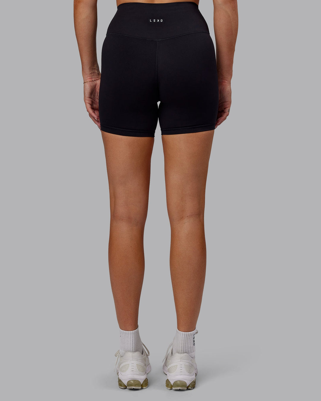 Woman wearing Fusion Mid Short Tights - Black No Pockets