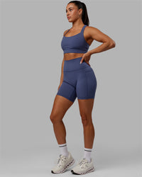 Woman wearing Fusion Ultra High-Rise 6" Short Pockets - Future Dusk | Model:Gabby | Size:S