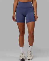 Woman wearing Fusion Ultra High-Rise 6" Short Pockets - Future Dusk | Model:Gabby | Size:S