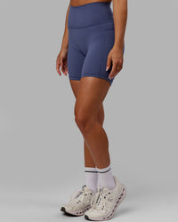 Woman wearing Fusion Ultra High-Rise 6" Short Pockets - Future Dusk | Model:Gabby | Size:S
