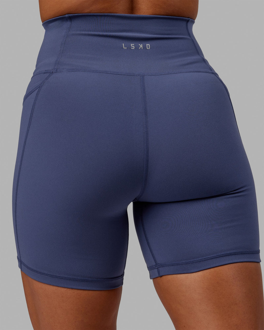 Woman wearing Fusion Ultra High-Rise 6" Short Pockets - Future Dusk | Model:Gabby | Size:S