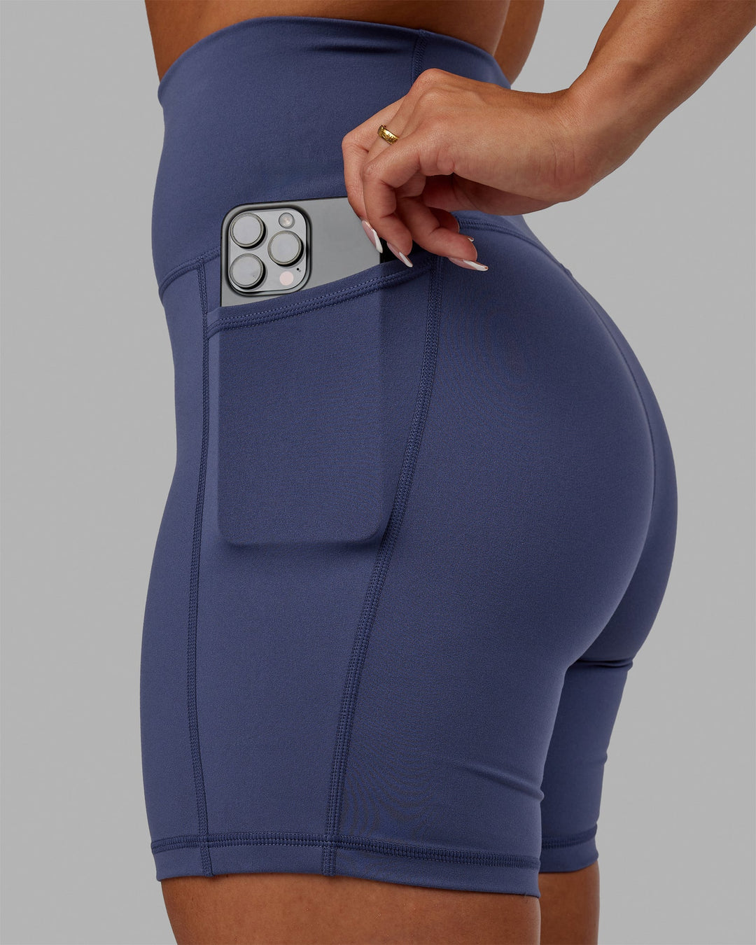 Woman wearing Fusion Ultra High-Rise 6" Short Pockets - Future Dusk | Model:Gabby | Size:S