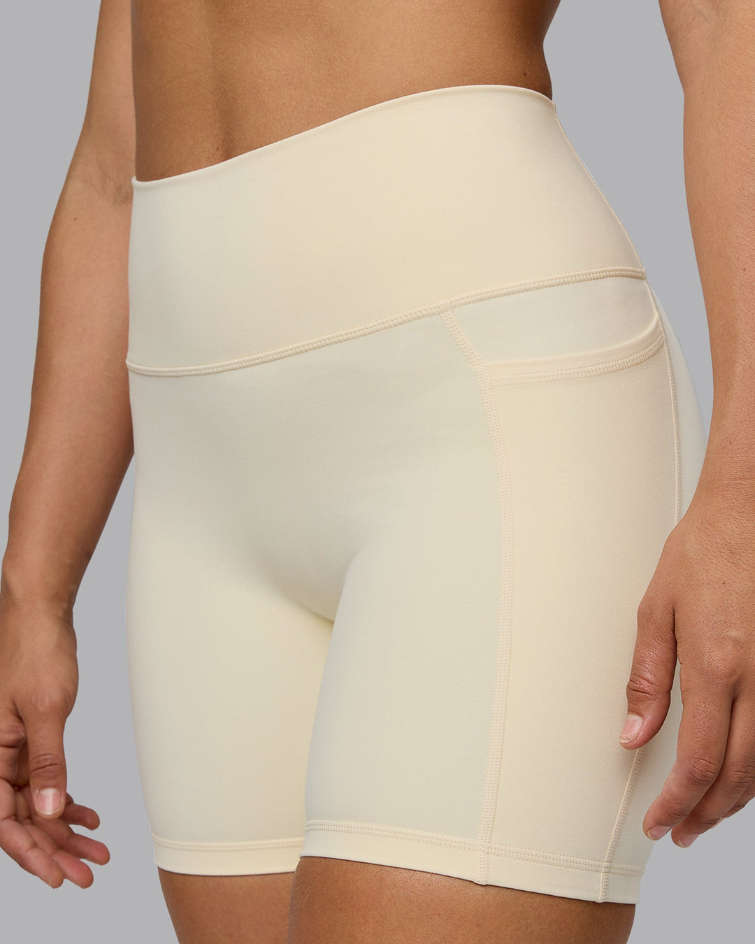 Woman wearing Fusion Mid Short Tights with Pockets - Ivory