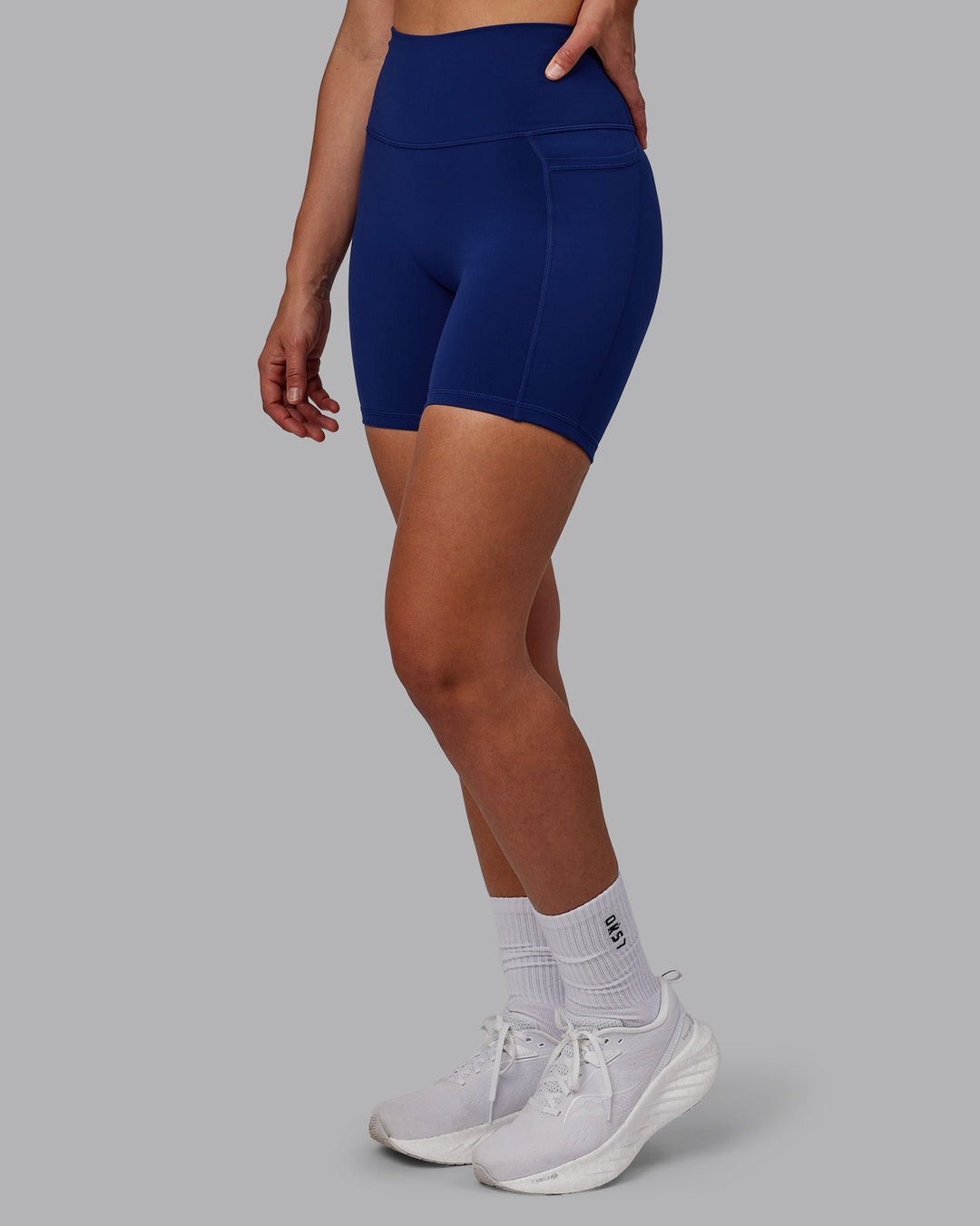 Woman wearing Fusion Mid-Length Shorts - Midnight Blue