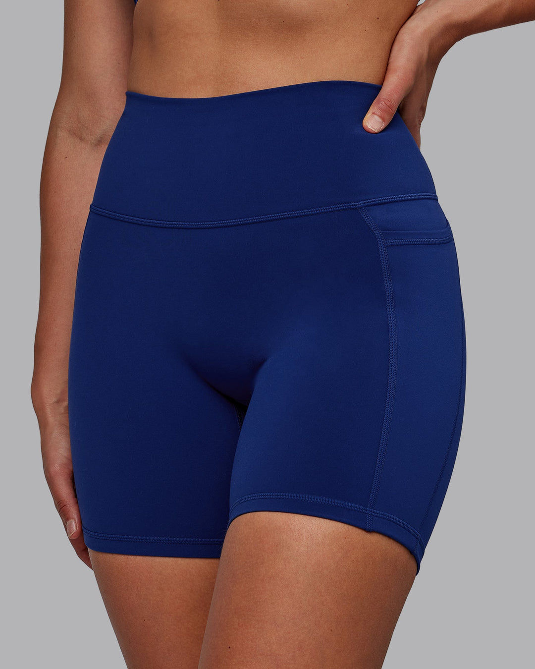 Woman wearing Fusion Mid-Length Shorts - Midnight Blue