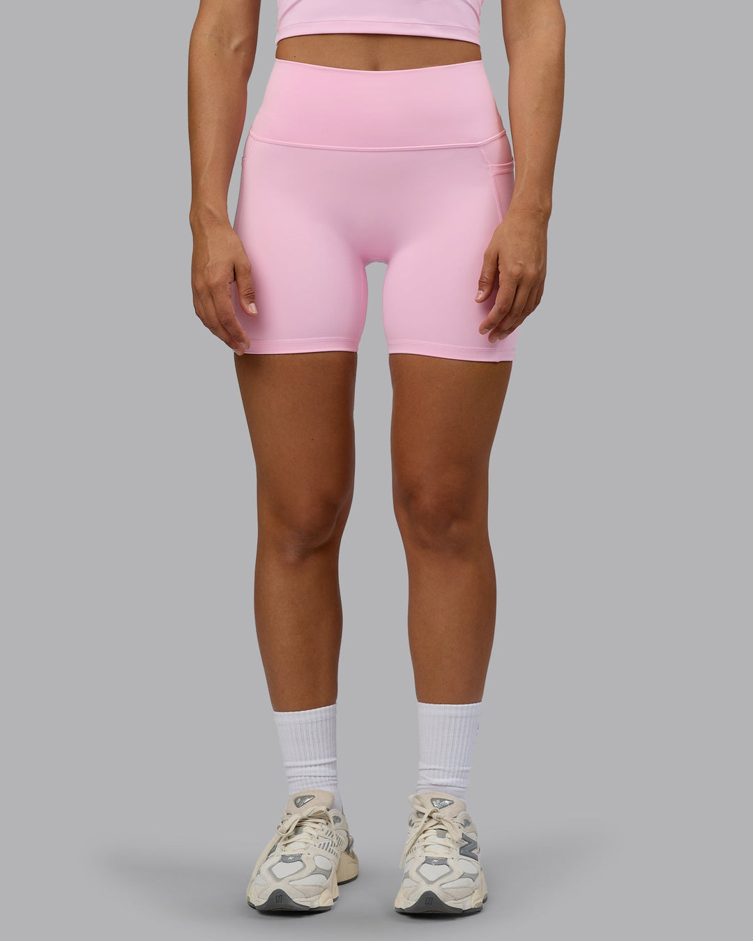 Woman wearing Fusion Mid Short Tights with Pockets - Pale Pink