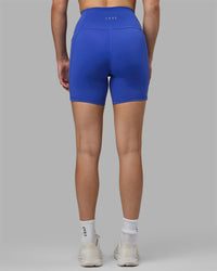 Woman wearing Fusion Ultra High-Rise 6" Short Pockets - Power Cobalt | Model:Hannah | Size:S