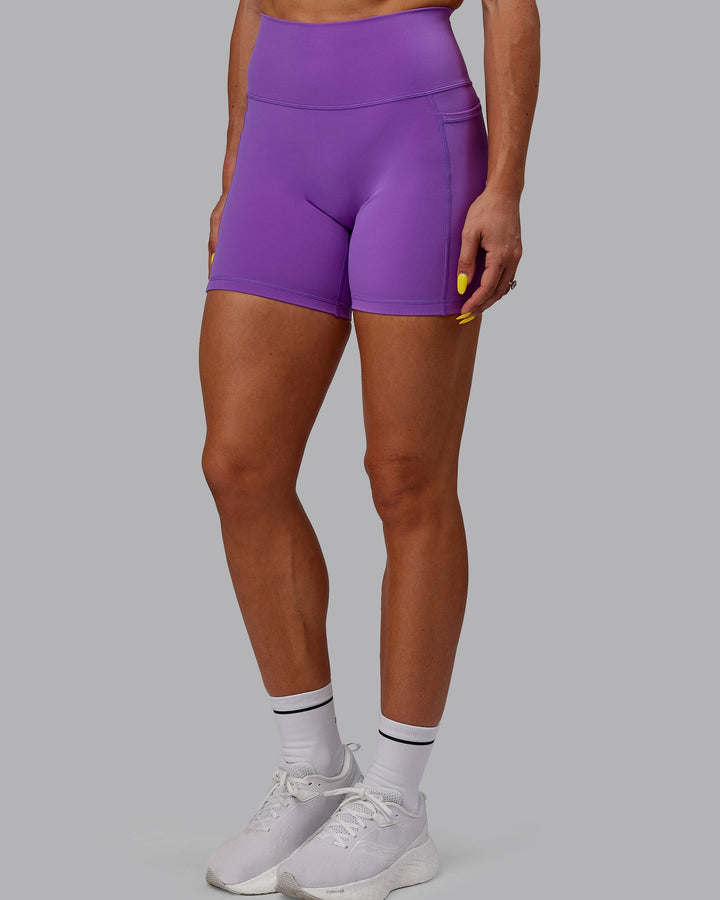 Woman wearing Fusion Mid-Length Shorts - Purple Swirl
