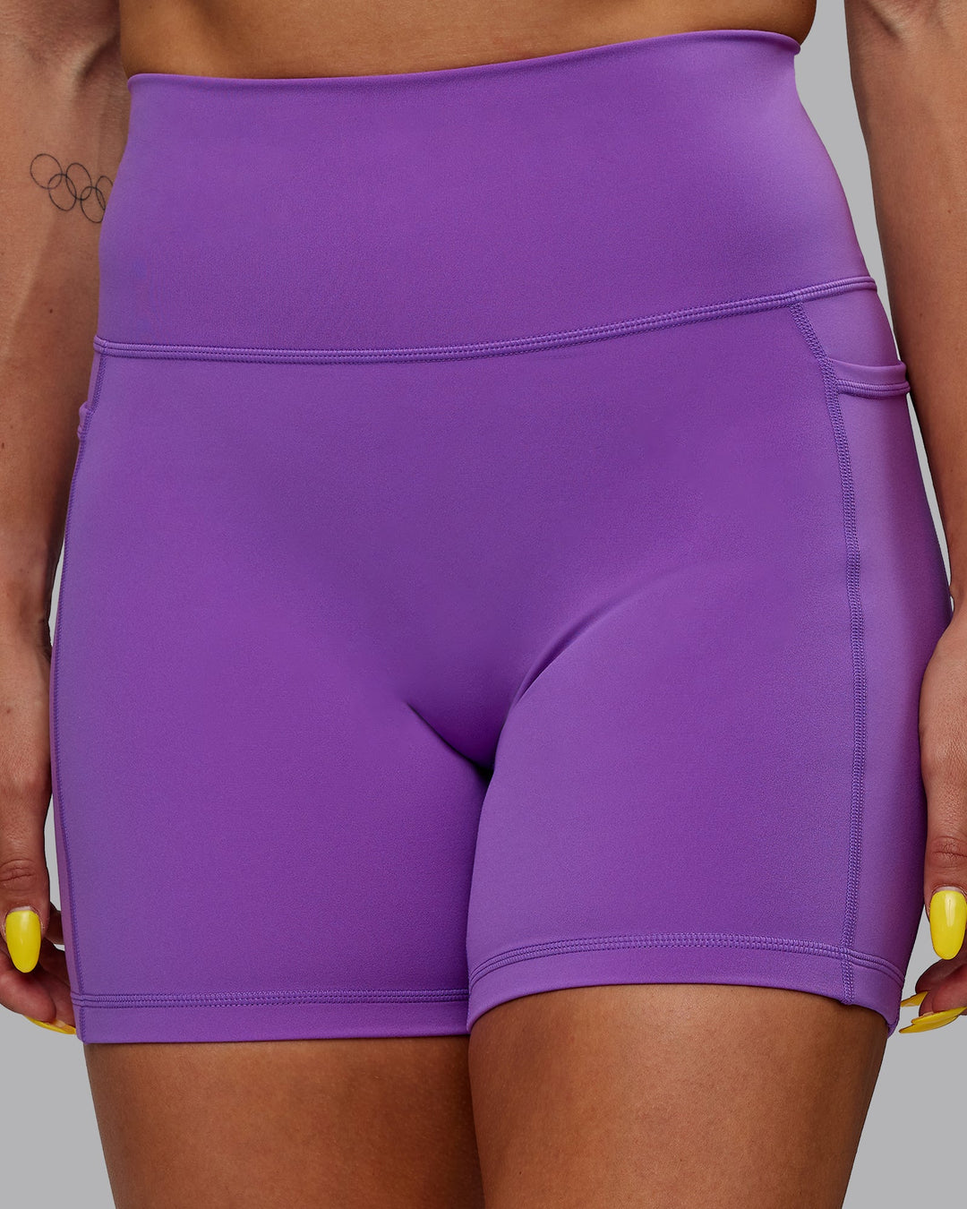 Woman wearing Fusion Mid-Length Shorts - Purple Swirl