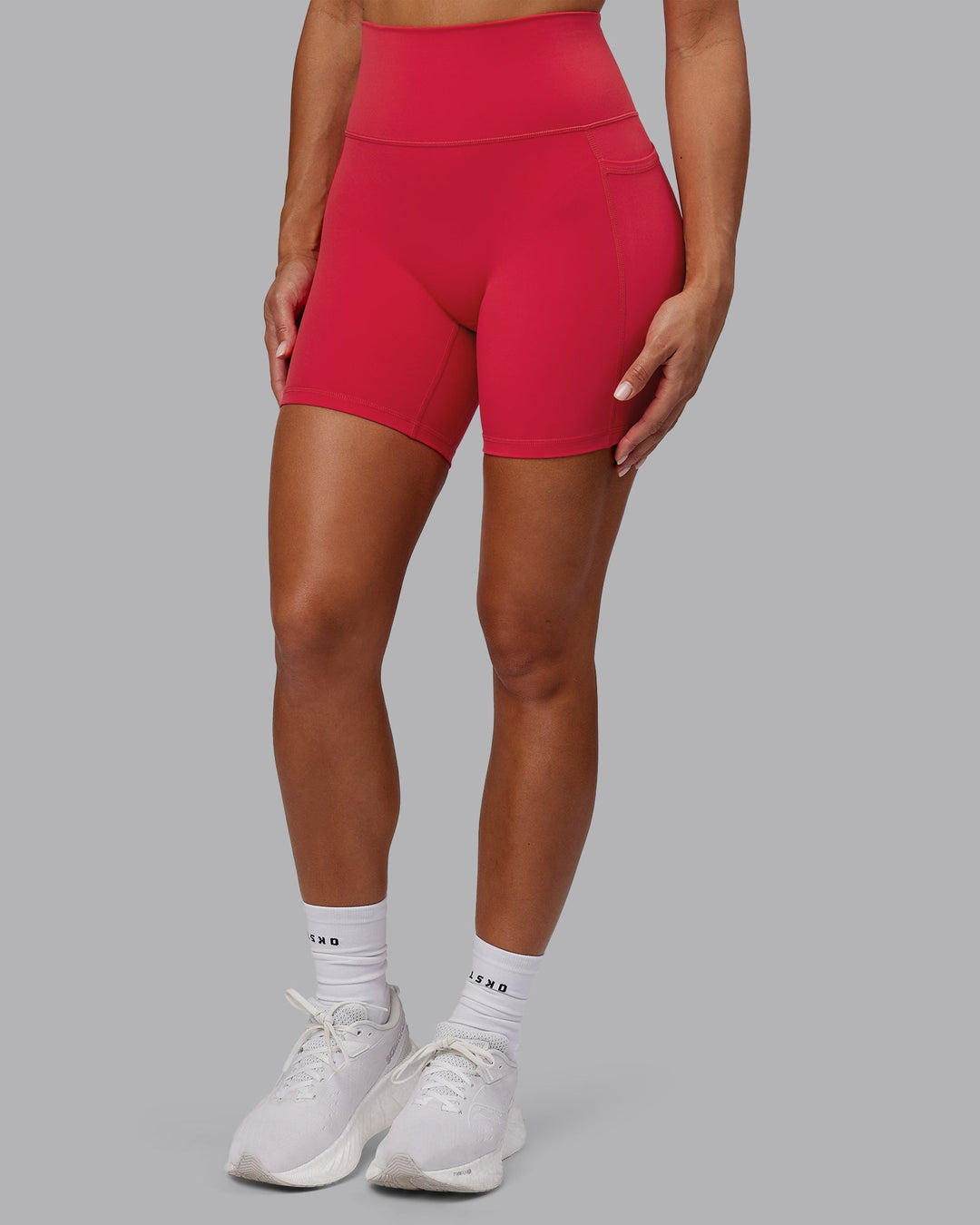 Woman wearing Fusion Mid-Length Shorts - Scarlet