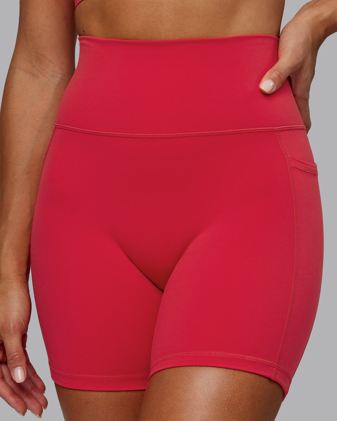 Woman wearing Fusion Mid-Length Shorts - Scarlet