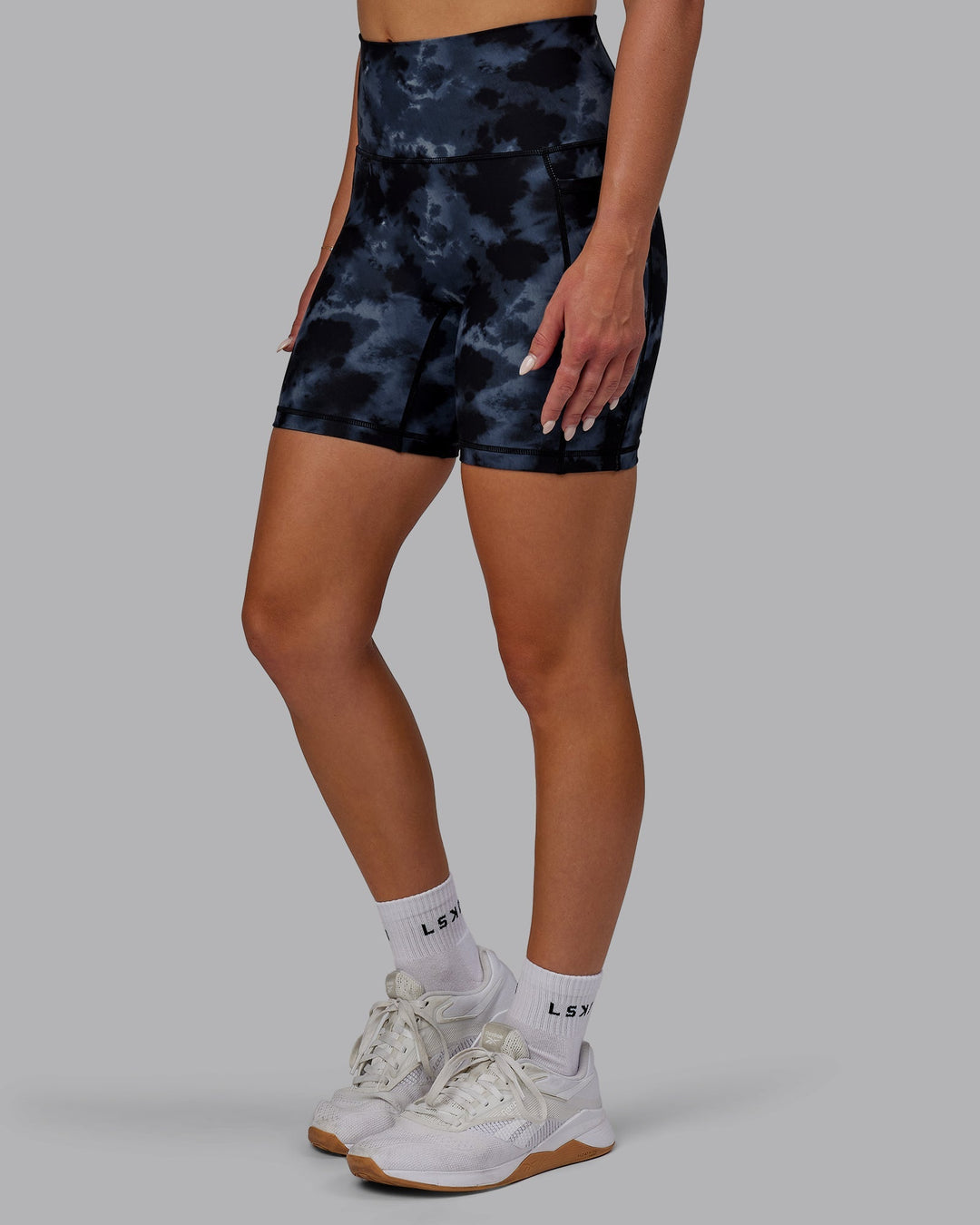 Woman wearing Fusion Mid-Length Shorts - Tie Dye-Midnight