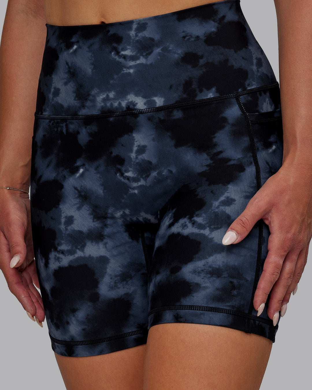 Woman wearing Fusion Mid-Length Shorts - Tie Dye-Midnight