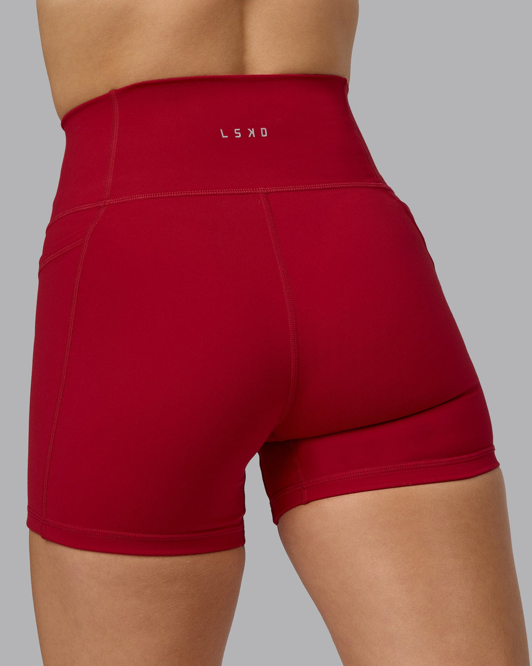 Woman wearing Fusion X-Short Tights with Pockets - Cherry Red