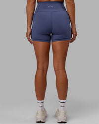 Woman wearing Fusion Ultra High-Rise 4" Short Pockets - Future Dusk | Model:Gabby | Size:S