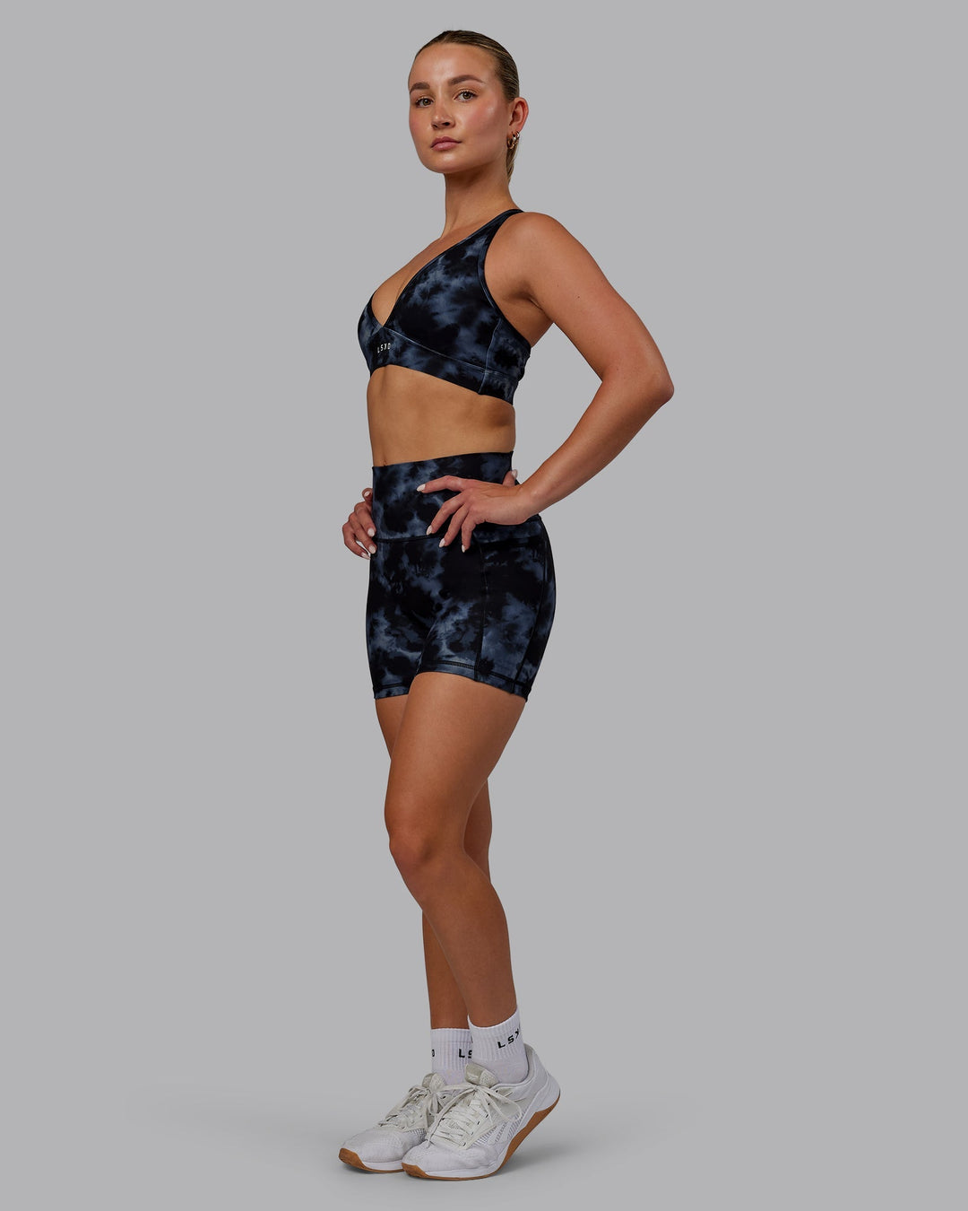 Woman wearing Fusion X-Length Shorts - Tie Dye-Midnight