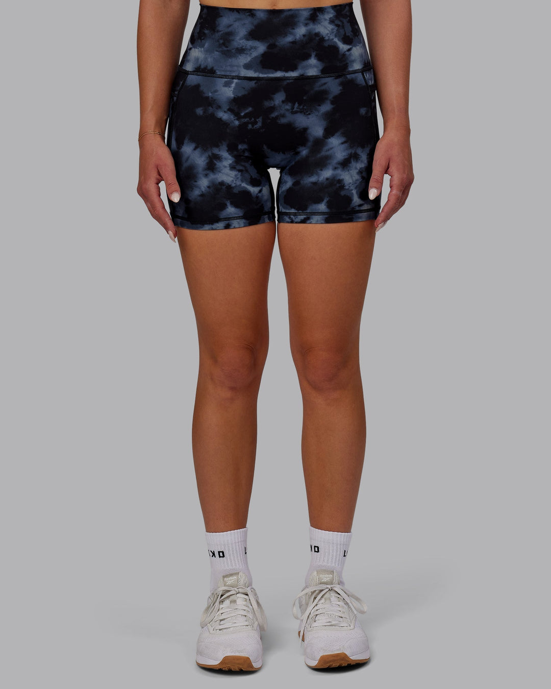 Woman wearing Fusion X-Length Shorts - Tie Dye-Midnight