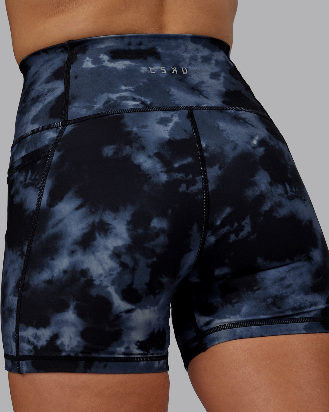 Woman wearing Fusion X-Length Shorts - Tie Dye-Midnight