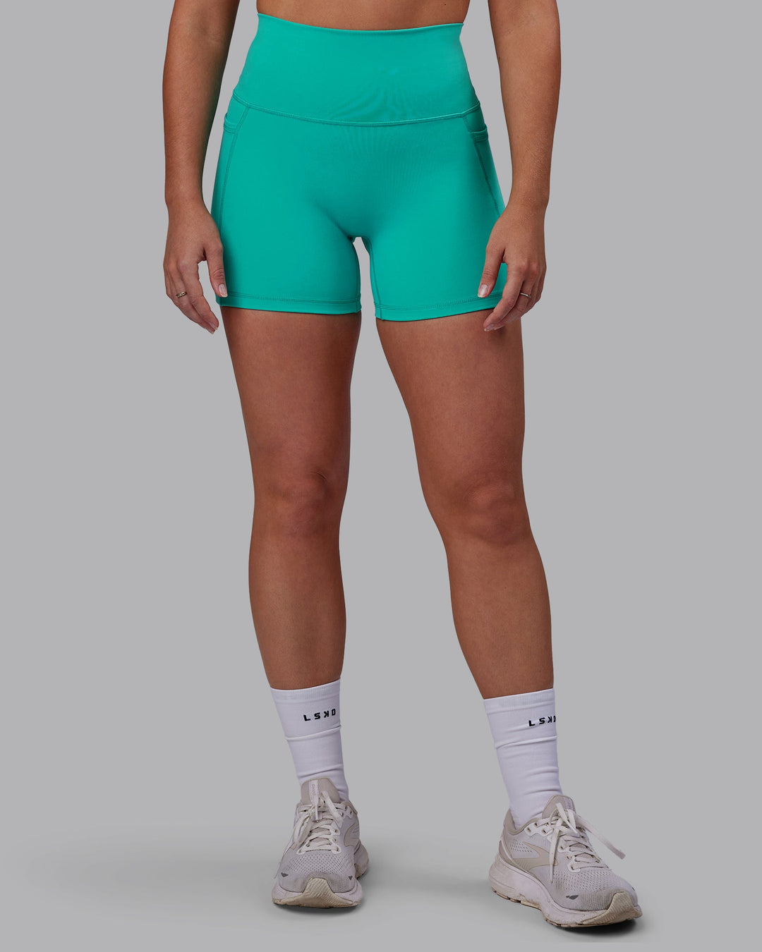 Woman wearing Fusion X-Length Shorts - Turquoise Tide