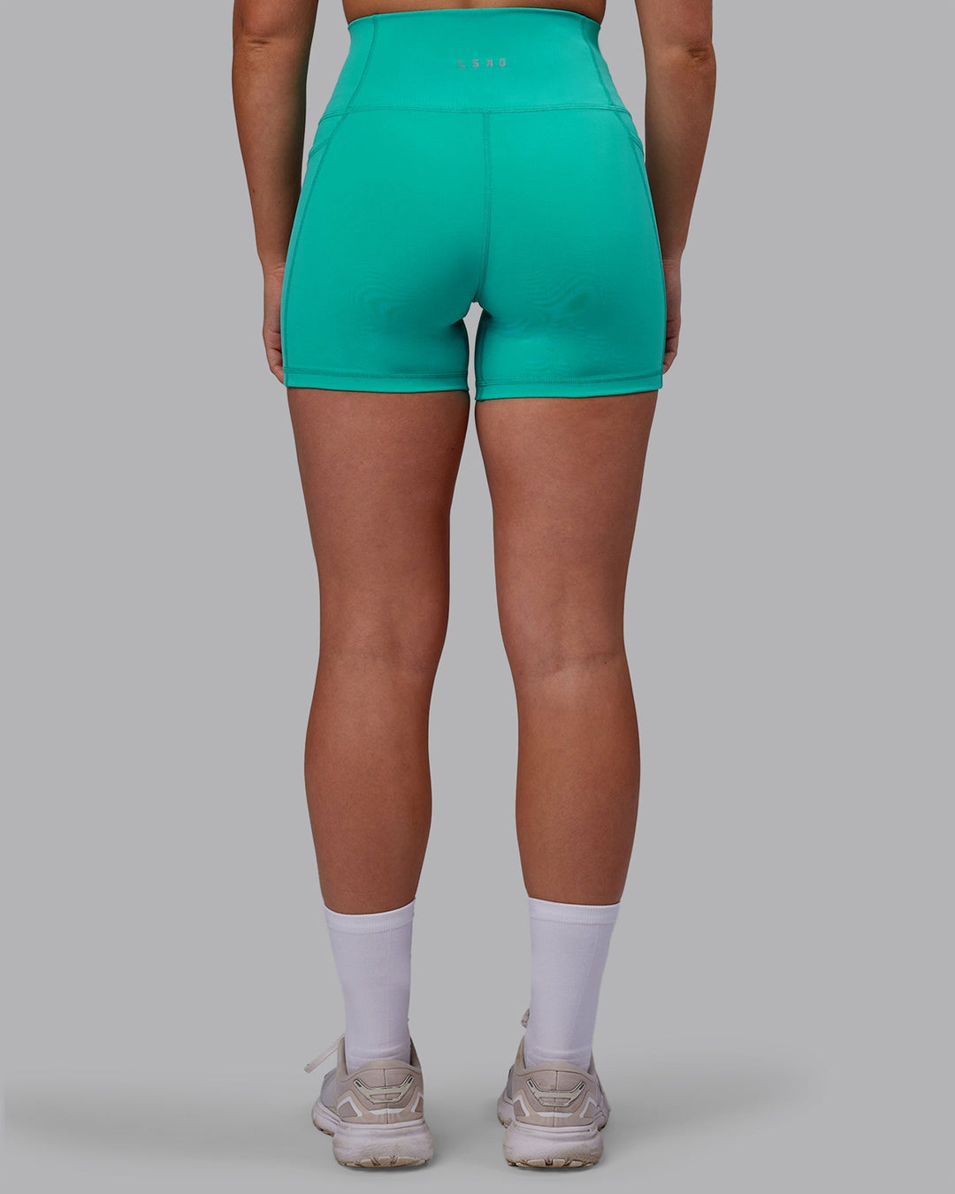 Woman wearing Fusion X-Length Shorts - Turquoise Tide