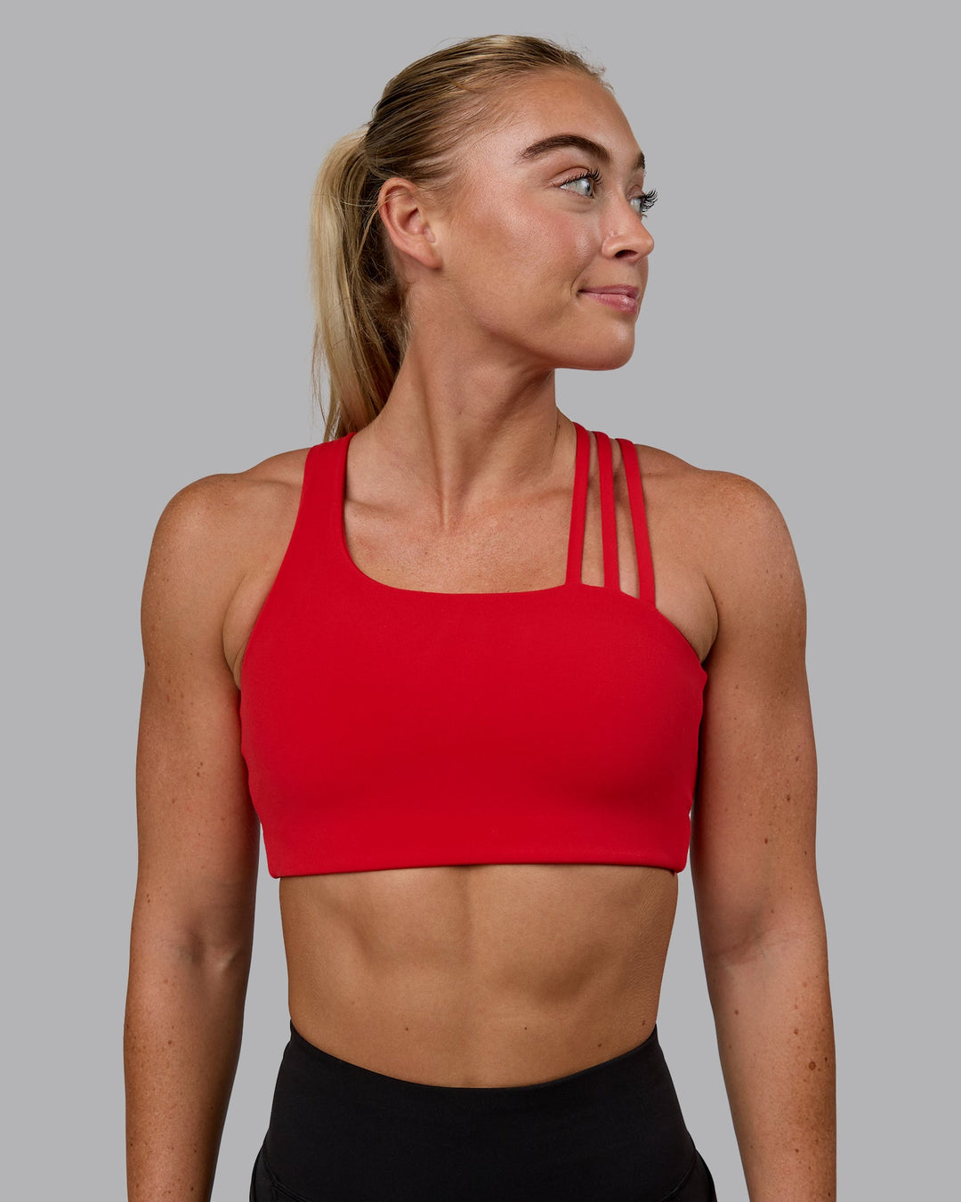 Woman wearing Galvanise Sports Bra - Crimson