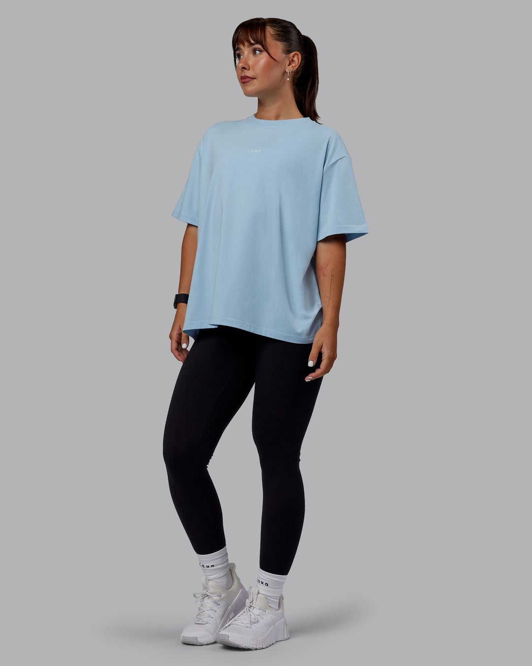 Woman wearing Go-To FLXCotton Oversized Tee - Glacial Blue-White