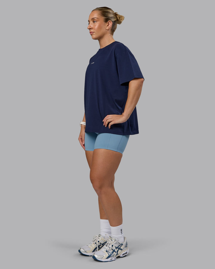 Woman wearing Go-To FLXCotton Oversized Tee - Future Navy-White
