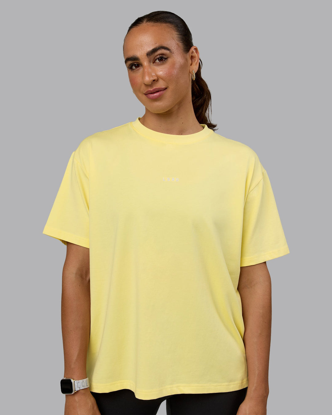 Woman wearing Go-To FLXCotton Oversized Tee - Lemon-White