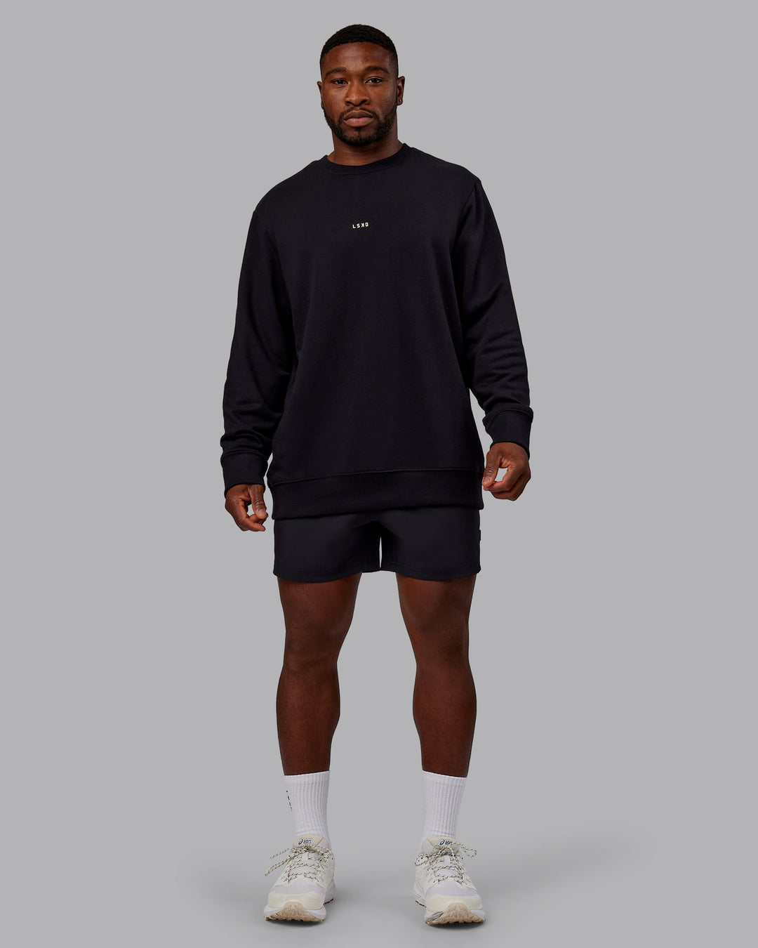 Man wearing Leg It Sweater - Black-Volt