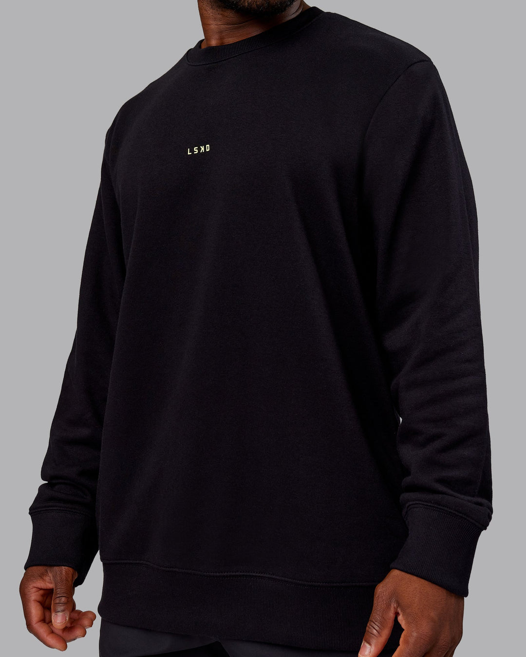 Man wearing Leg It Sweater - Black-Volt