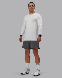 Man wearing Lift 6" Lined Performance Shorts - Dark Storm