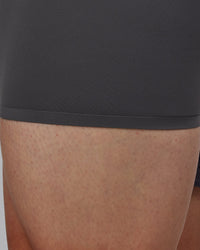 Man wearing Lift 6" Lined Performance Shorts - Dark Storm