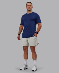 Man wearing Lift 6" Lined Performance Shorts - Digital Mist