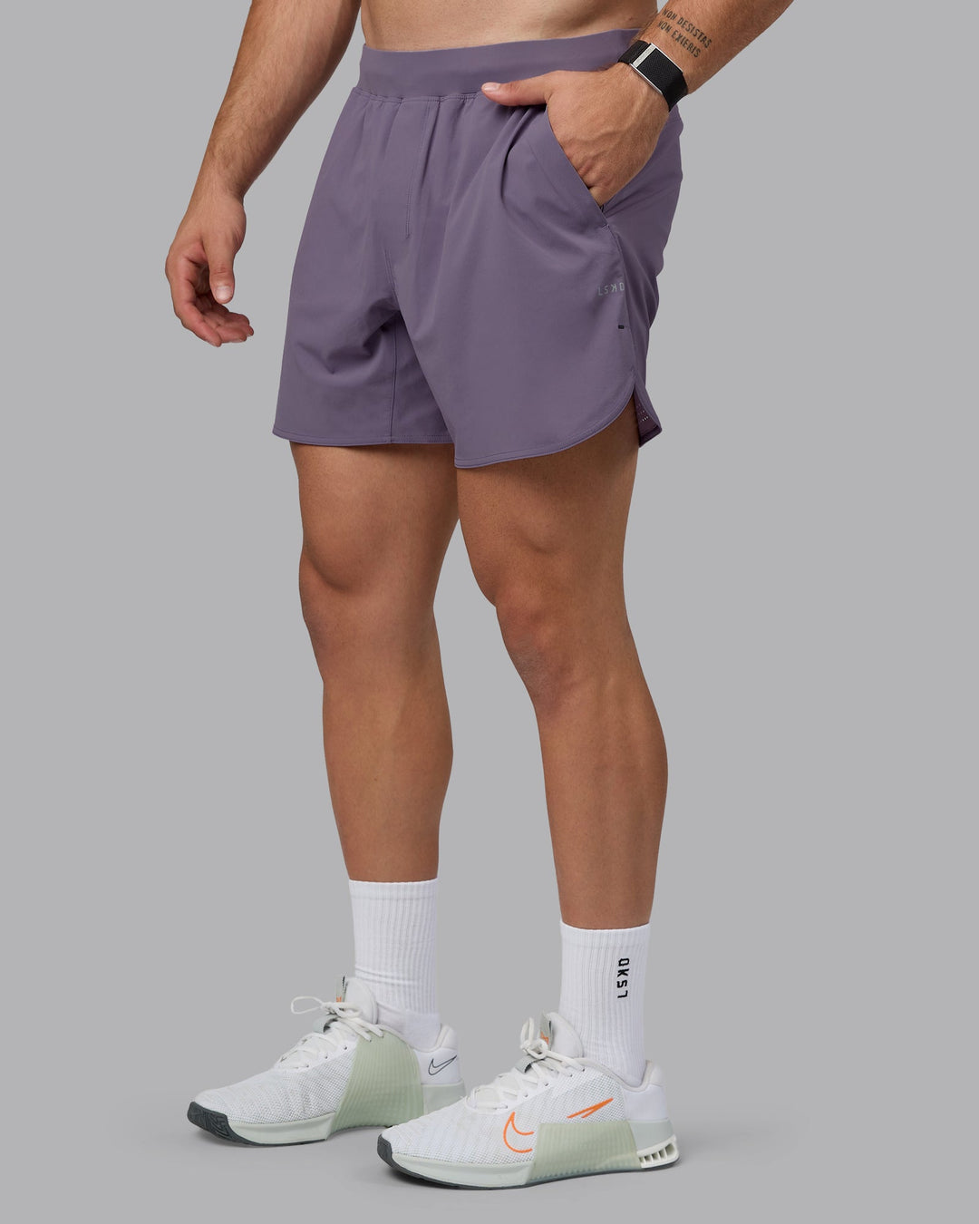 Man wearing Lift 6&quot; Lined Performance Shorts - Purple Sage