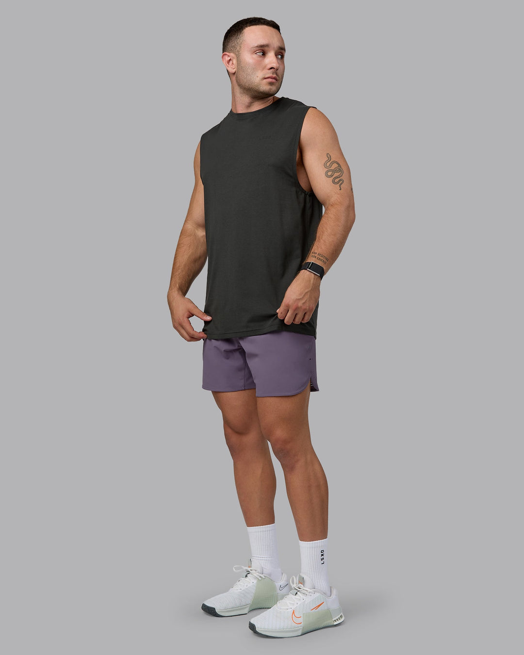 Man wearing Lift 6&quot; Lined Performance Shorts - Purple Sage