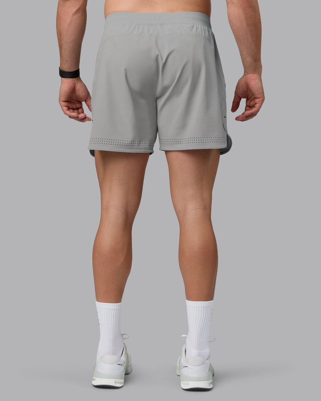 Man wearing Lift 6&quot; Performance Shorts - Circular Grey