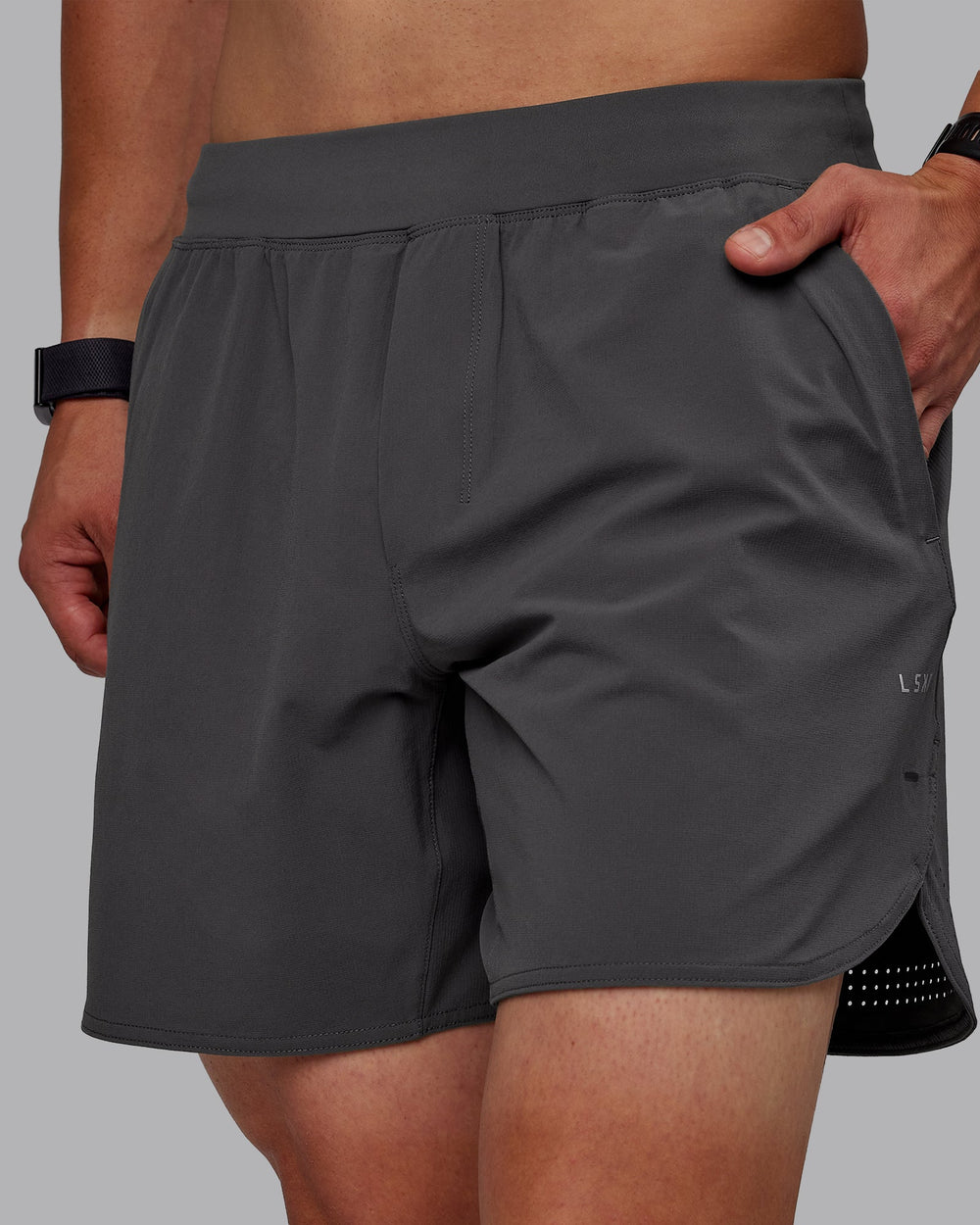 Man wearing Lift 6" Performance Shorts - Dark Storm