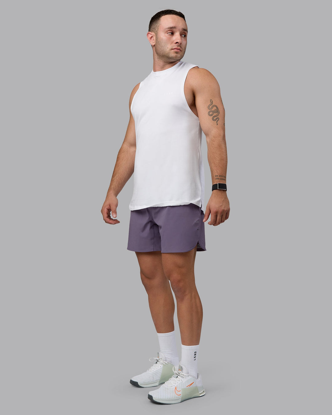 Man wearing Lift 6&quot; Performance Shorts - Purple Sage