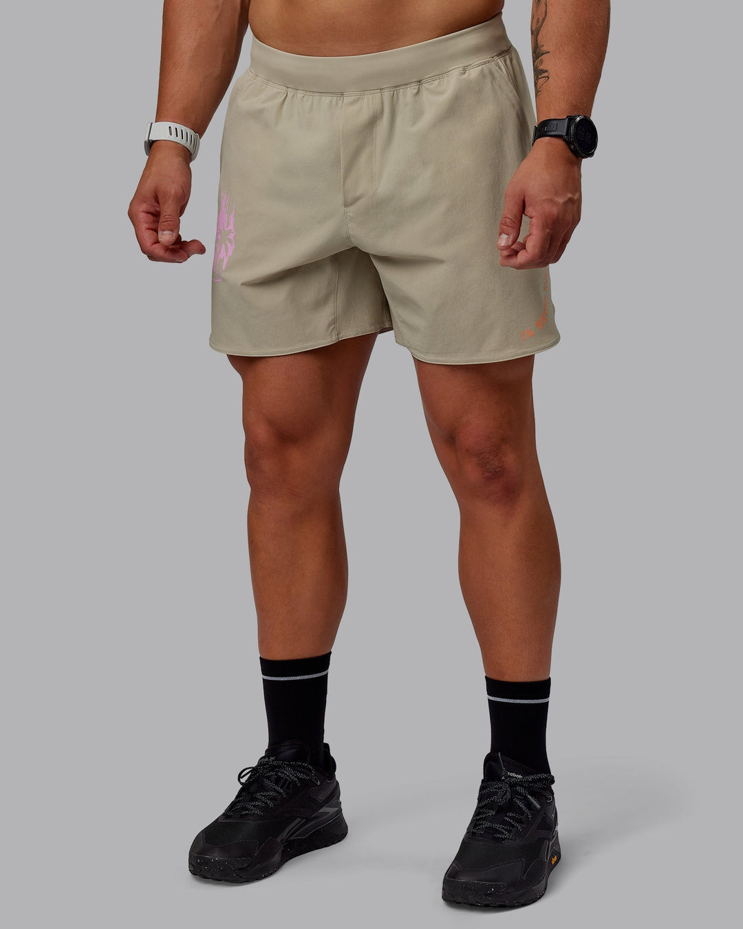 Man wearing Lift 6&quot; Performance Shorts - Sustained Grey-So Cal 24