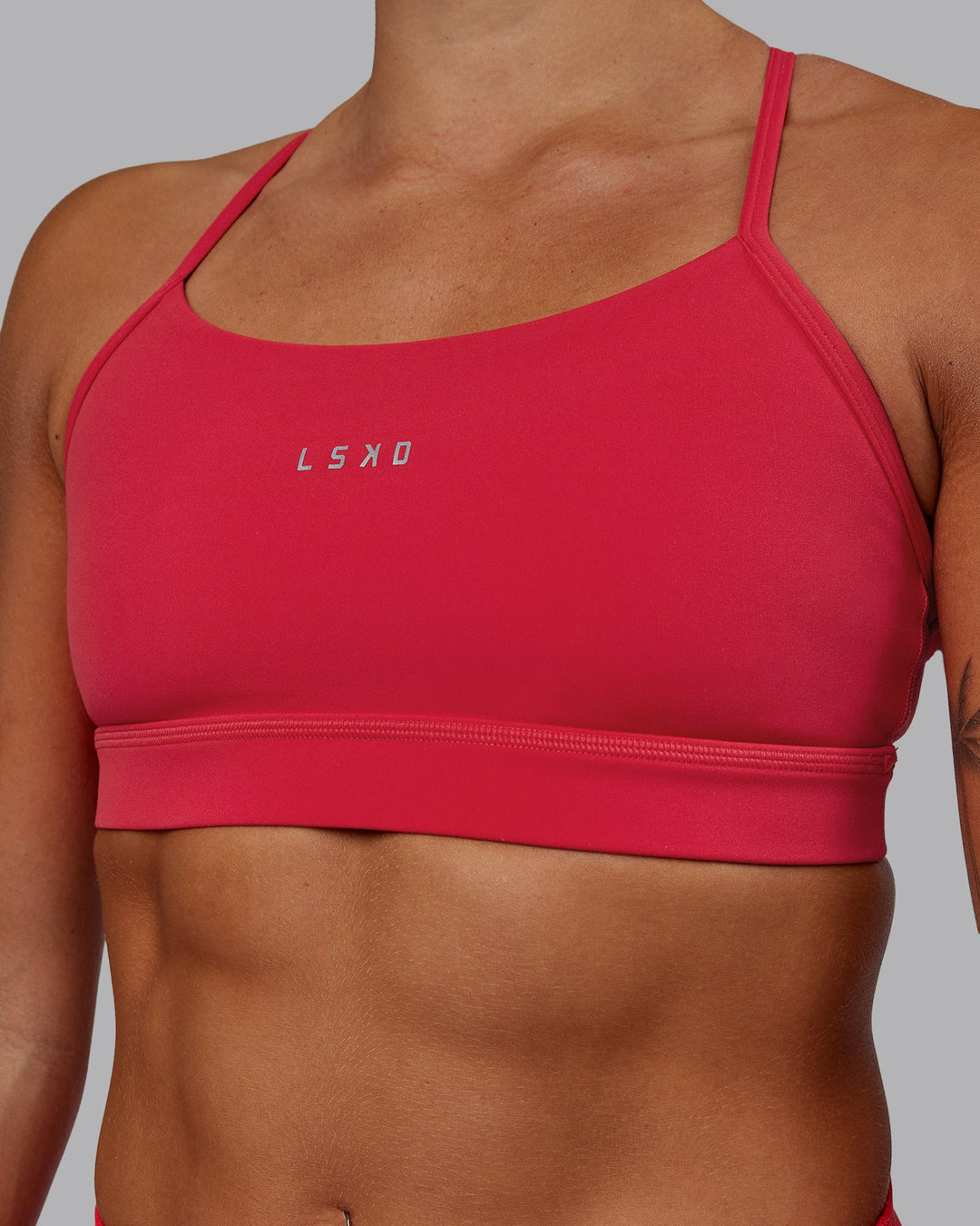 Woman wearing Lift Sports Bra - Scarlet