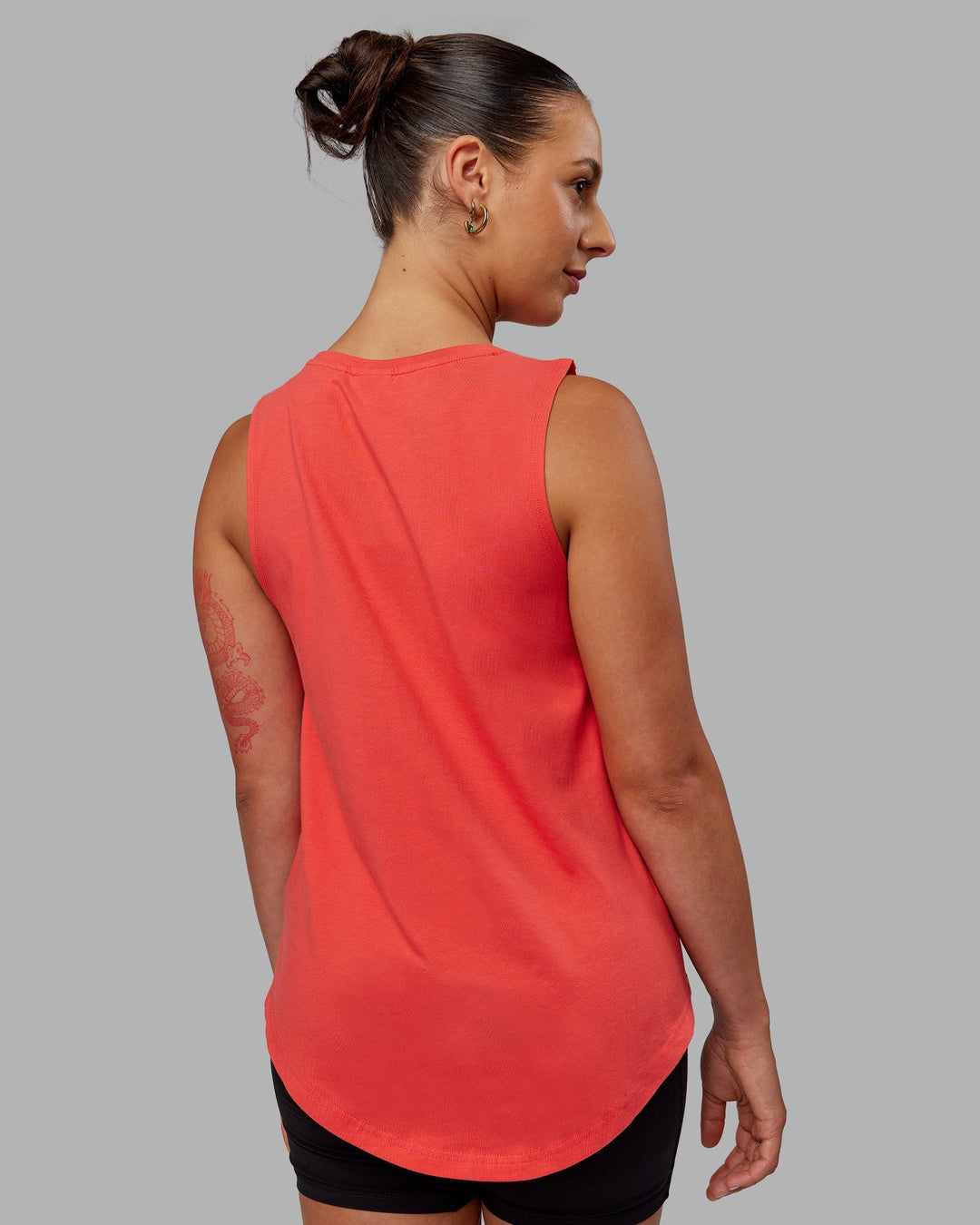 Woman wearing Luna FLXCotton Longline Tank - Cayenne-White