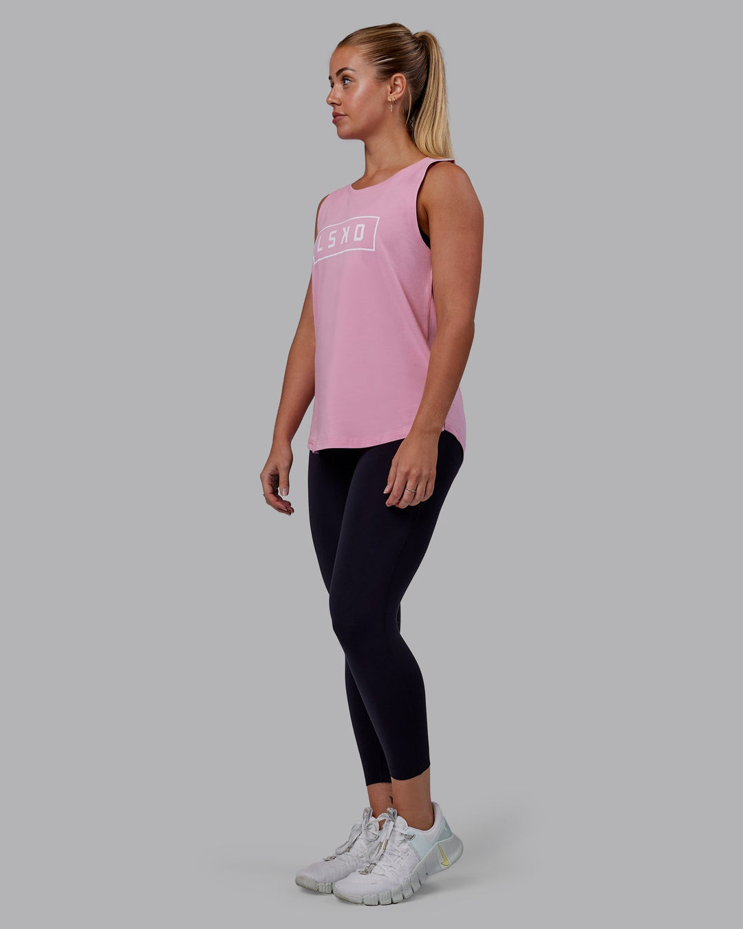 Woman wearing Luna FLXCotton Longline Tank - Bubblegum-White