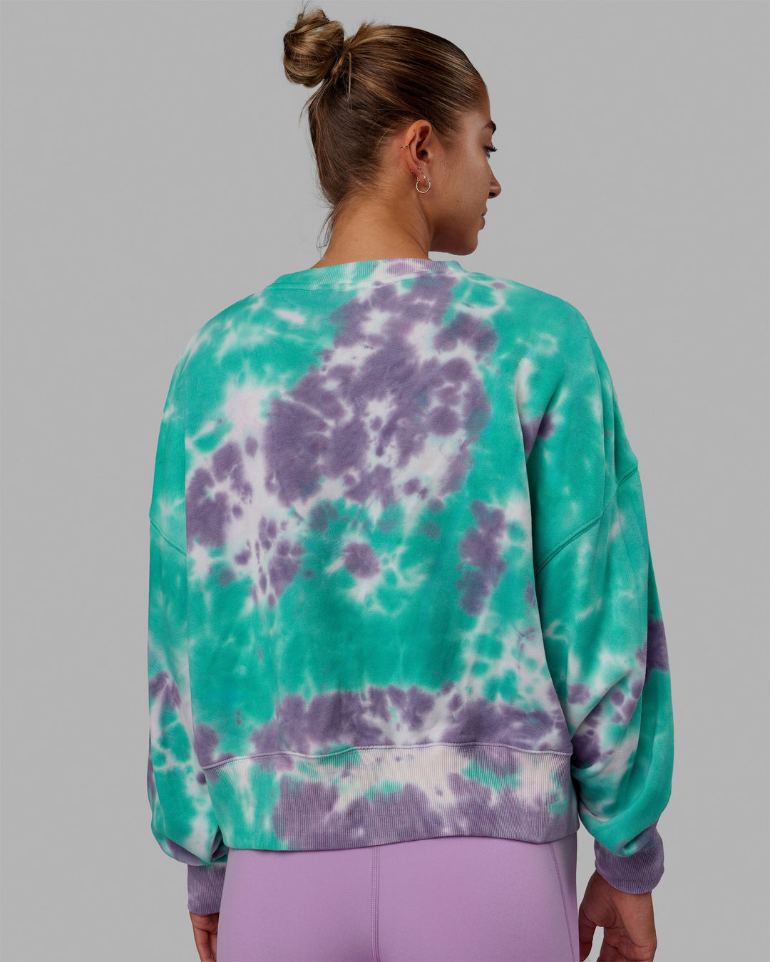 Woman wearing MVP Oversized Sweater - Cockatoo-Tie Dye