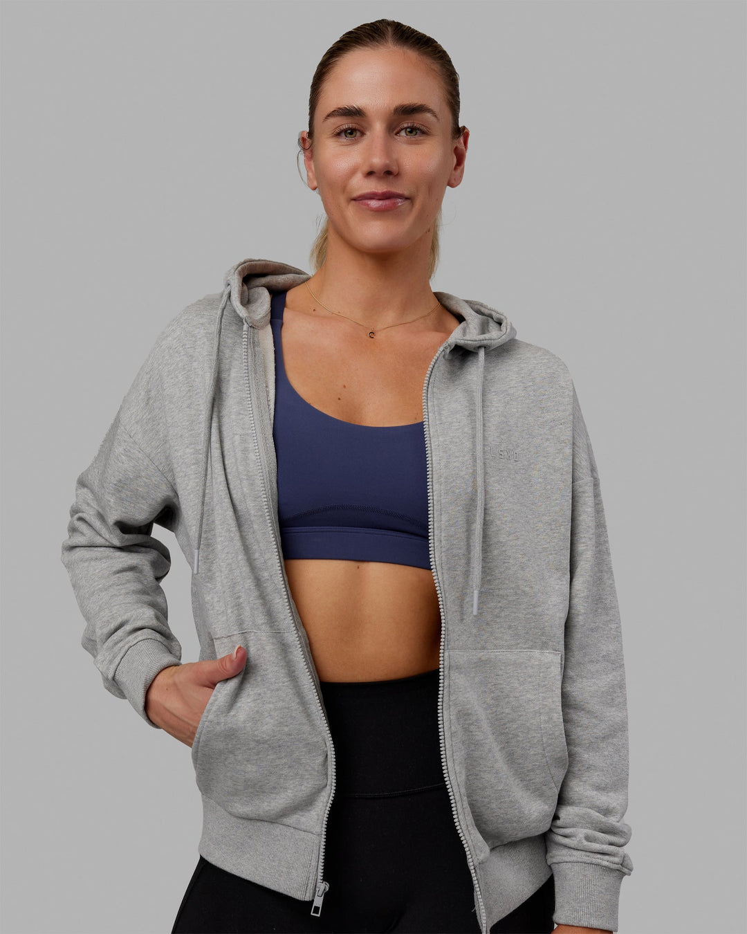 Woman wearing MVP Zip Through Hoodie - Light Grey Marl