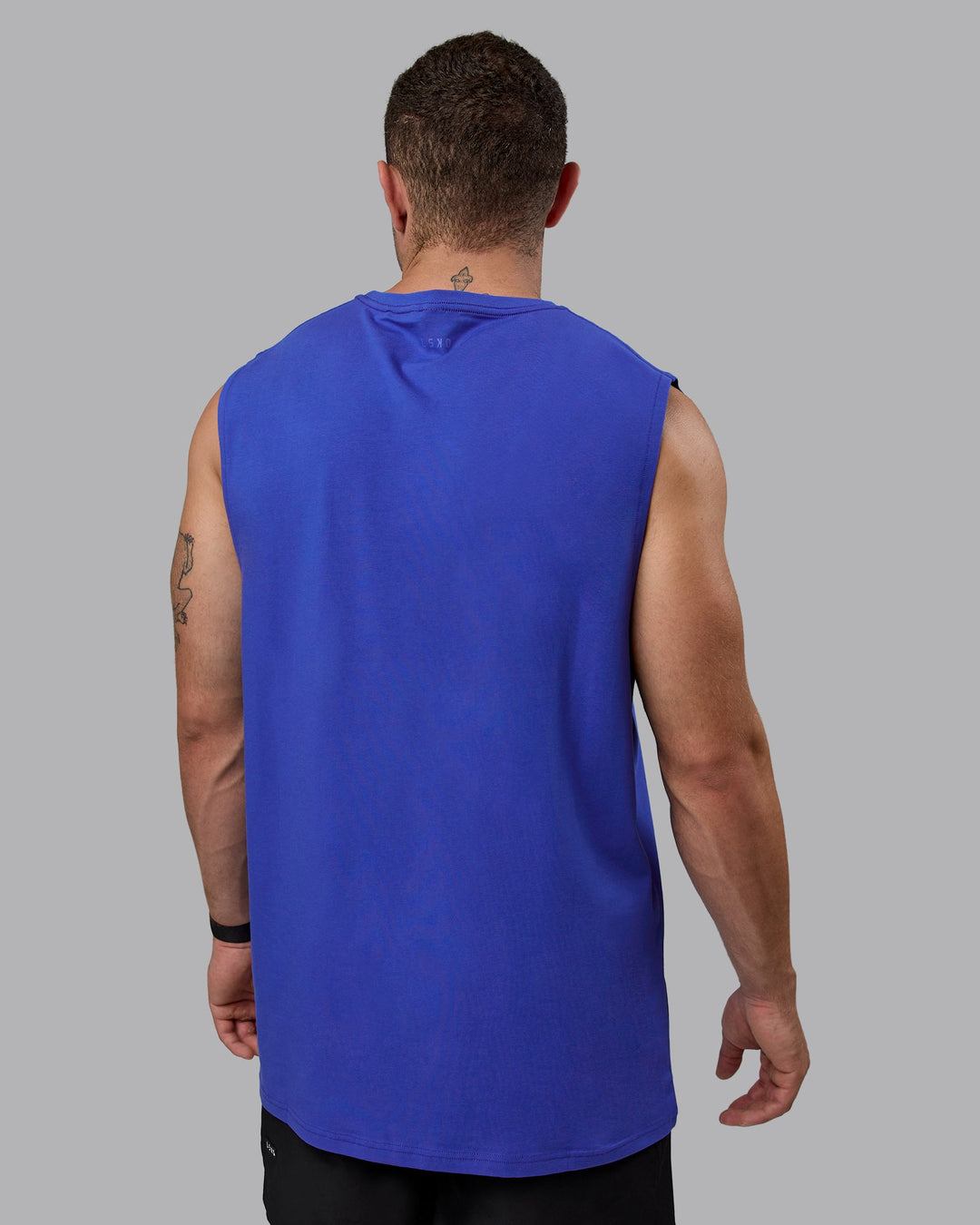 Man wearing 1% Better FLXCotton Training Fit Tank - Power Cobalt