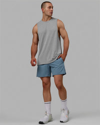 Wan wearing AeroFLX+ Seamless Muscle Tank - Light Grey Marl