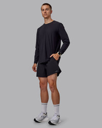 Man wearing Cadence Long Sleeve Tee - Black