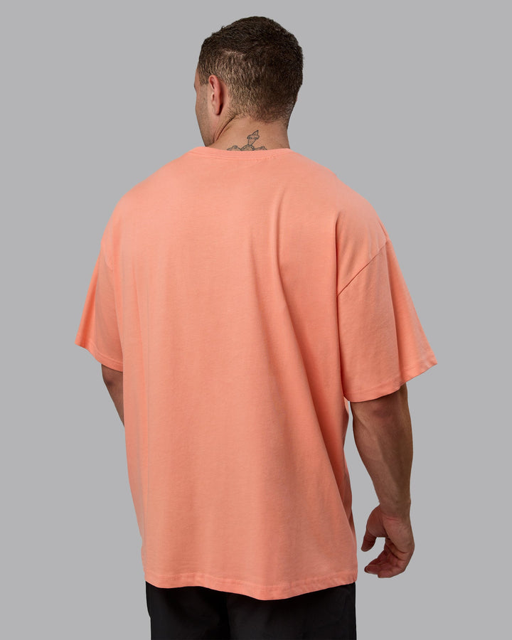 Man wearing MVP Heavyweight Tee Oversize - Mellow Peach
